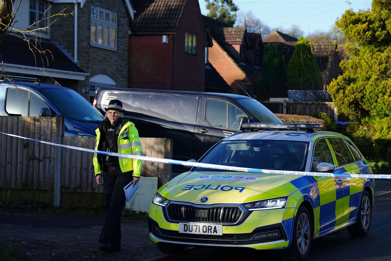 A cordon has been put in place around the property where the bodies were found (Peter Byrne/PA)