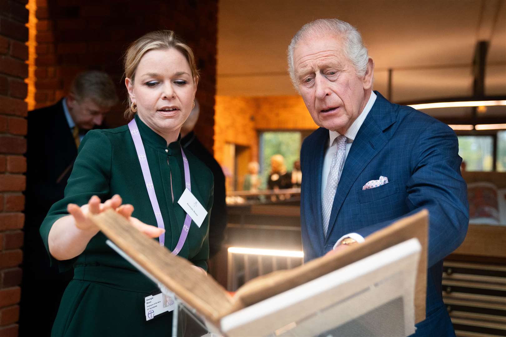 Charles looks at historic artefacts during a visit to Lambeth Palace Library (James Manning/PA)
