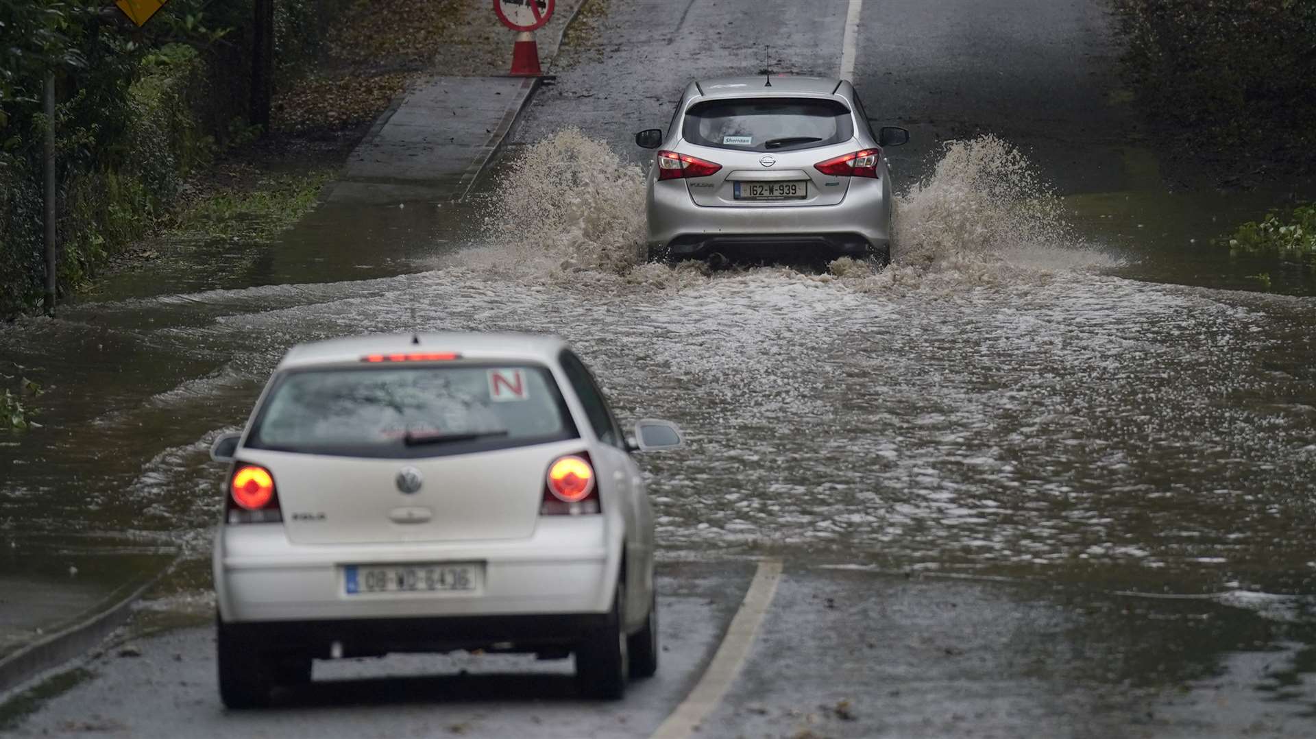 Storm Babet left roads under water in parts of Ireland last month (PA)