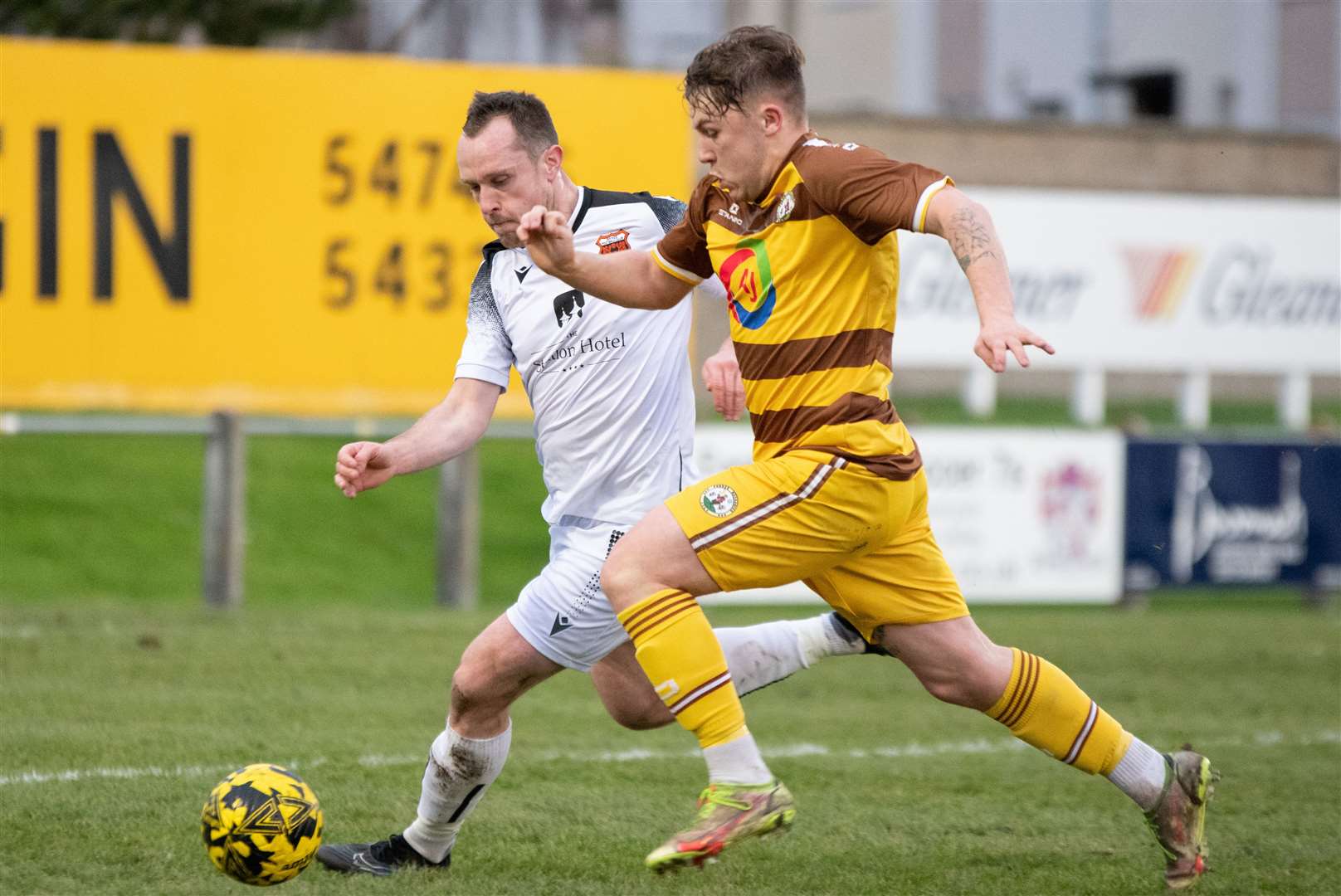 Forres forward Shaun Morrison and Rothes centre back Charlie MacDonald were the goal scorers in the draw. Forres Mechanics FC (0) vs Rothes FC (1) - Highland Football League 23/24 - Mosset Park, Forres 25/11/2023...Picture: Daniel Forsyth..