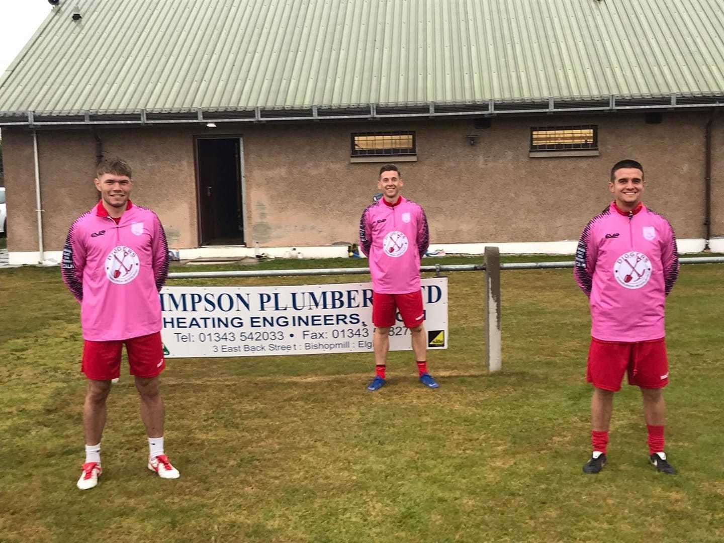 Forres Thistle players received new training kits from Mental Mechanics after their efforts in a recent hour-long run. Left to right: Ross Paterson, Neil Moir and Danny Black try on their new kits.