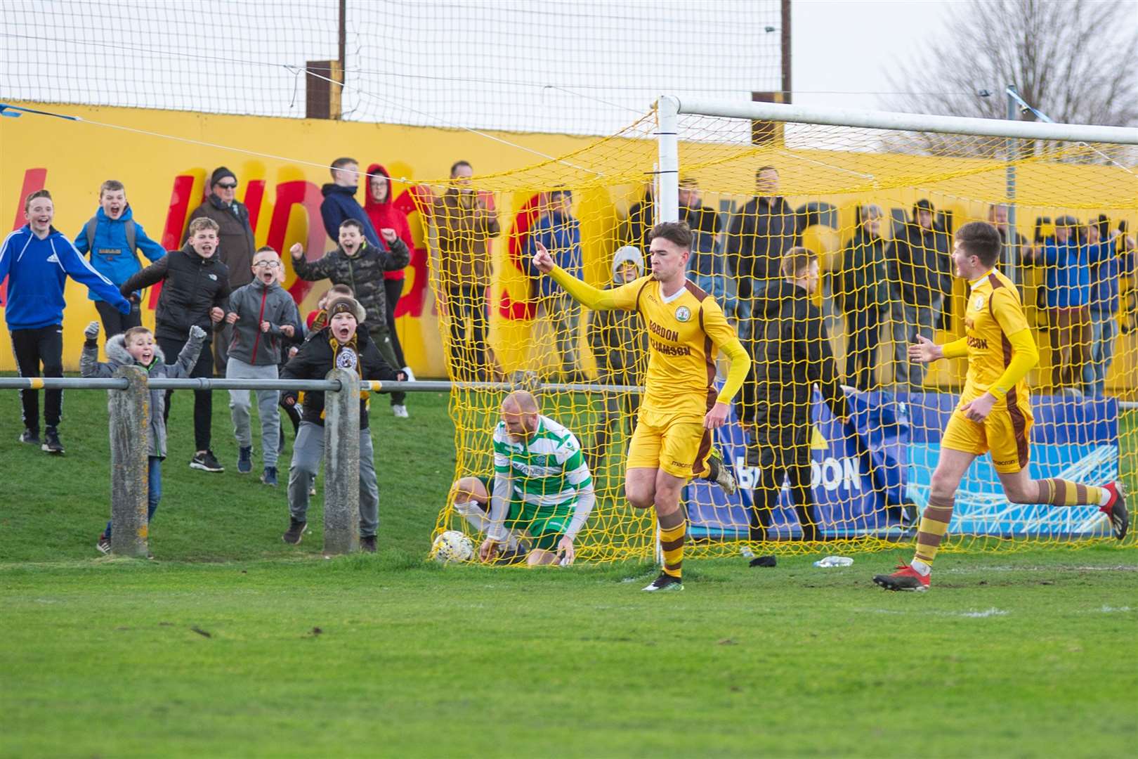 Forres Mechanics' Declan Hughes, on-loan from Ross County, celebrates scoring the second goal of the afternoon. ..Forres Mechanics FC (2) vs Buckie Thistle FC (2) - Highland Football League - Mosset Park, Forres 08/02/2020...Picture: Daniel Forsyth..