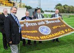 The Highland League Championship flag is presented to Forres Mechanics before Saturday’s match with Brora Rangers. From left are Finlay Noble, Highland League President; John Grant, league secretary; Dr James Anderson, Forres chairman; Charlie Rowley, For