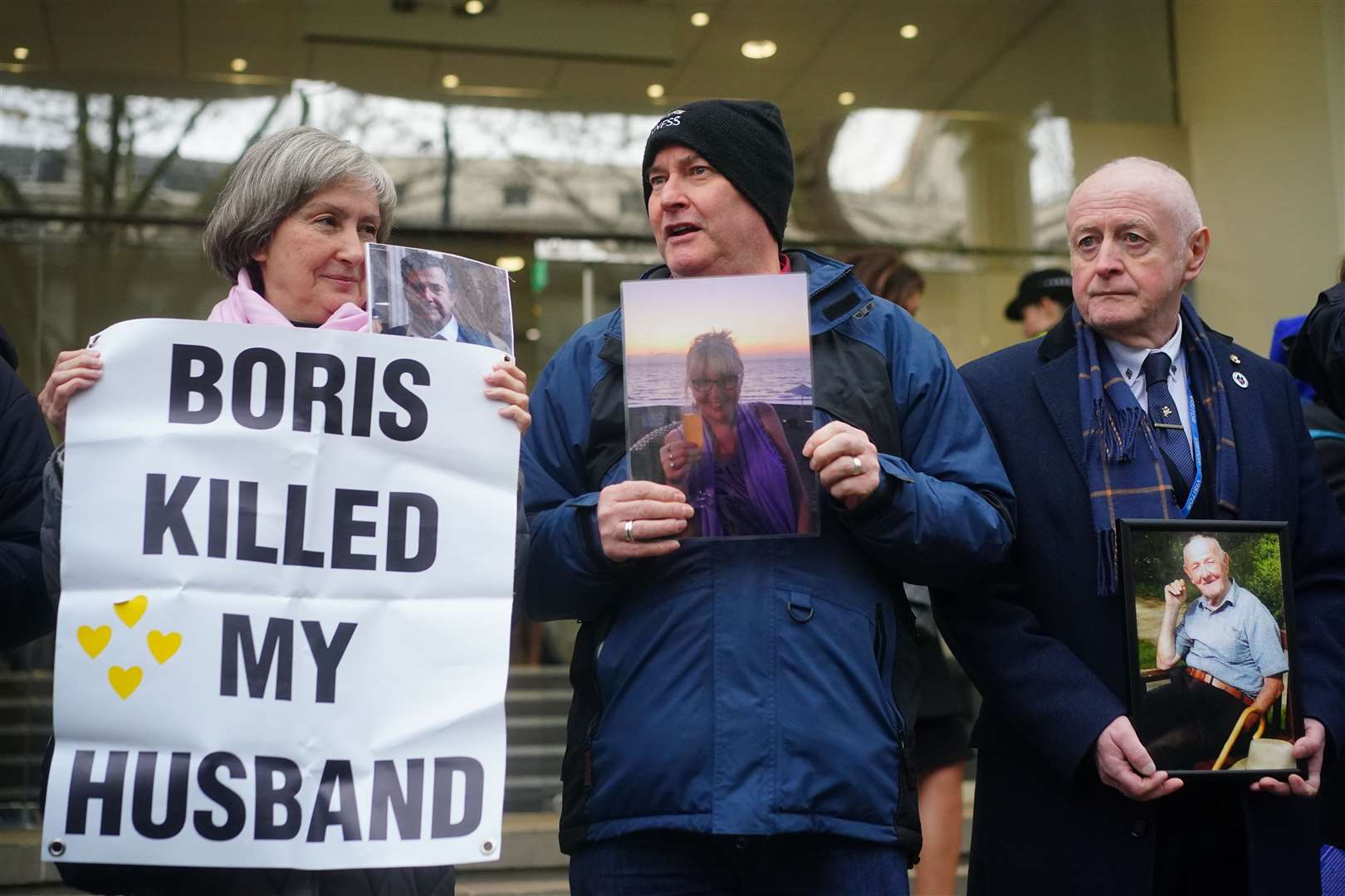 Protesters outside the UK Covid-19 Inquiry on Thursday (Victoria Jones/PA)
