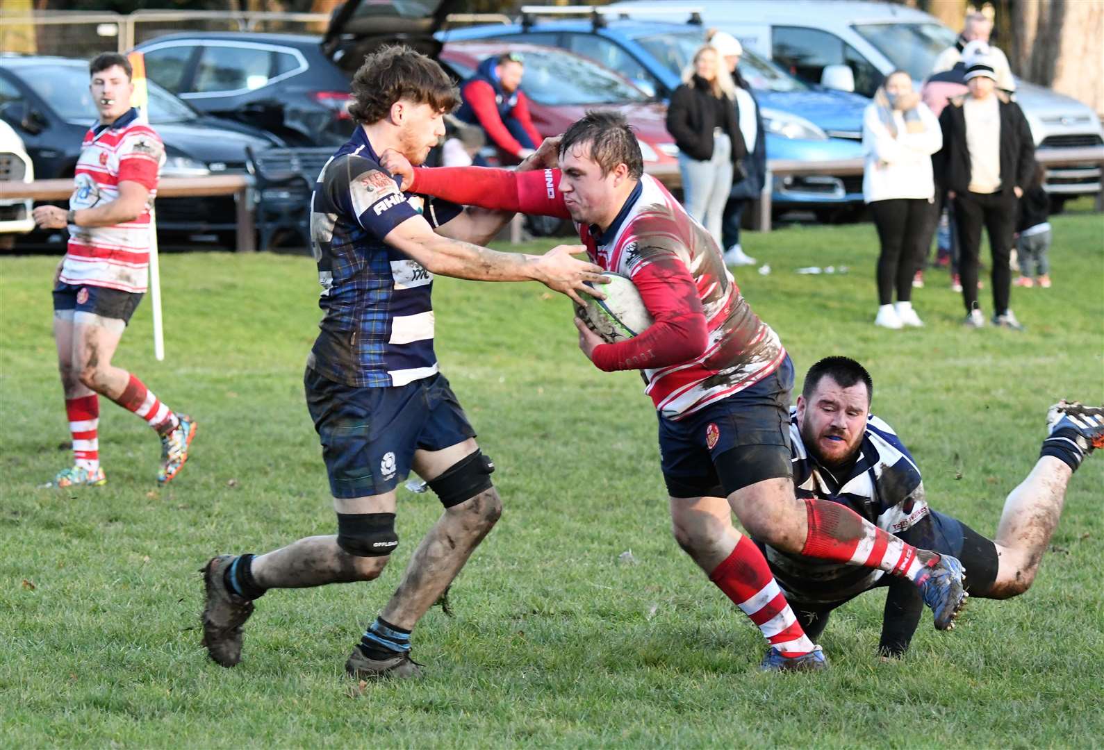 Cameron Hughes drives through double tackle. Picture by James Officer