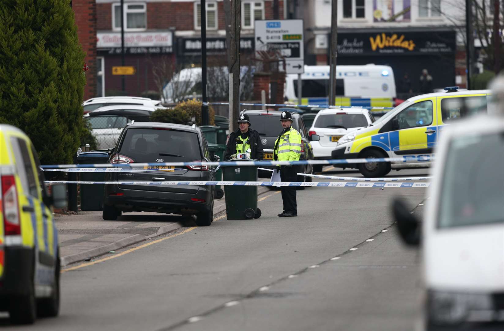 Police near the scene after Sean Fitzgerald was shot (Aaron Chown/PA)