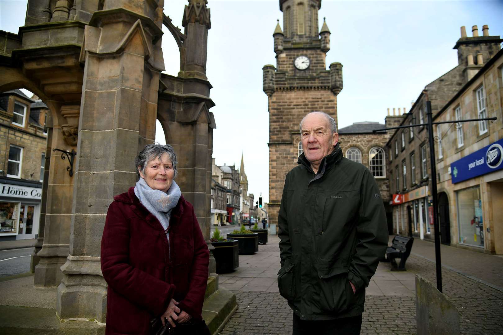 Councillors and local volunteers George Alexander and Lorna Creswell at the Mercat Cross, Forres. Picture: Becky Saunderson..