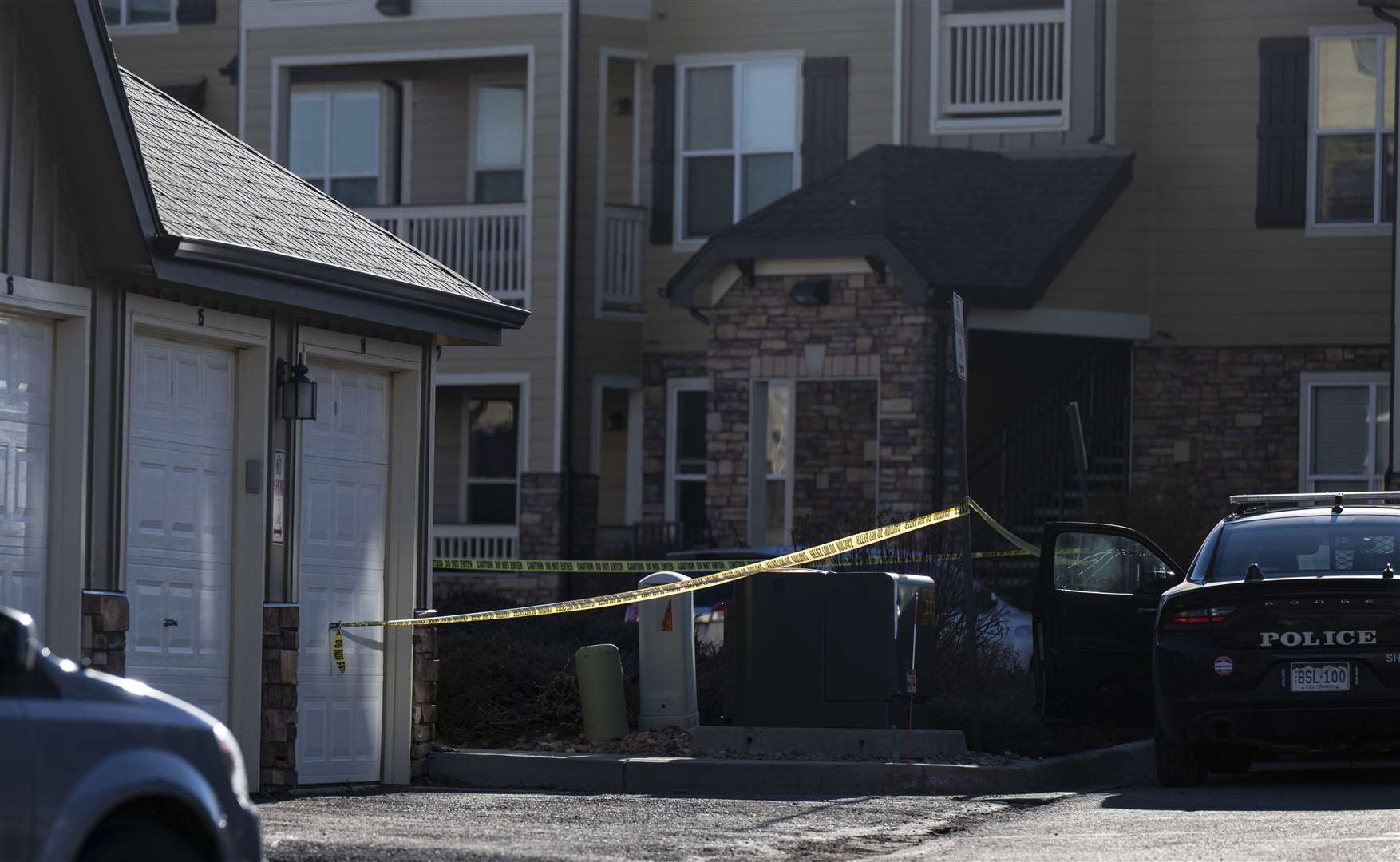 Police tape around the home in Colorado where two children were found dead (Parker Seibold/The Gazette/AP)