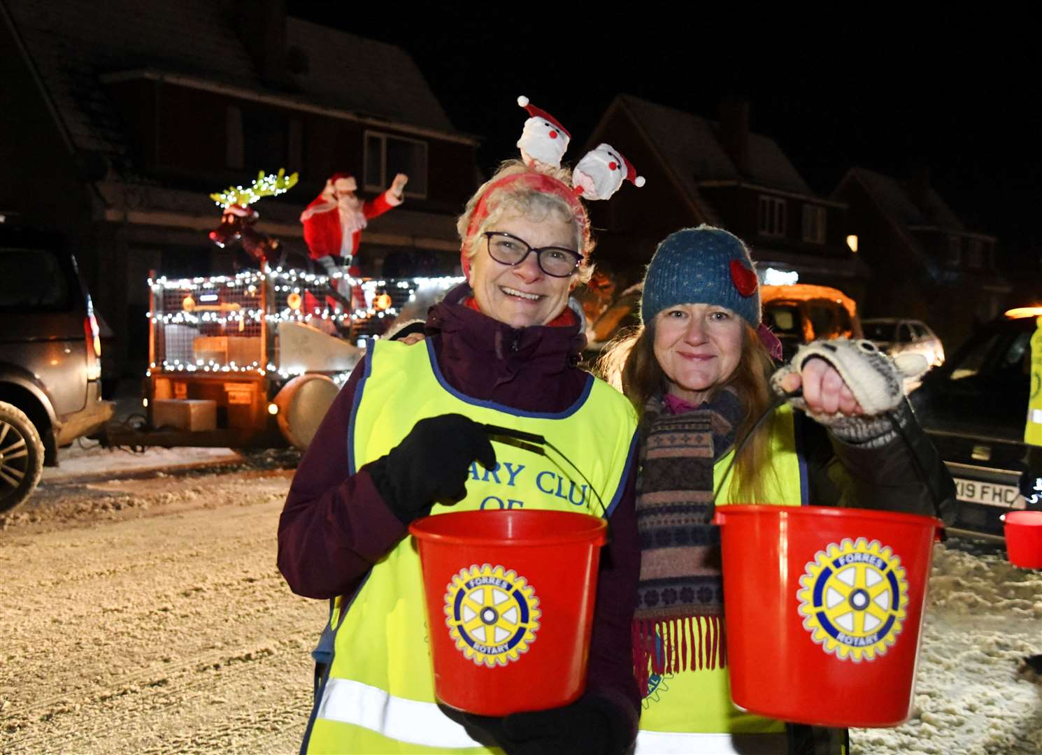 Sarah Higgs (left) and Kay Denby (right) collecting donations on behalf of Forres Rotary for local causes and The Fire Fighters Charity. Picture: Beth Taylor