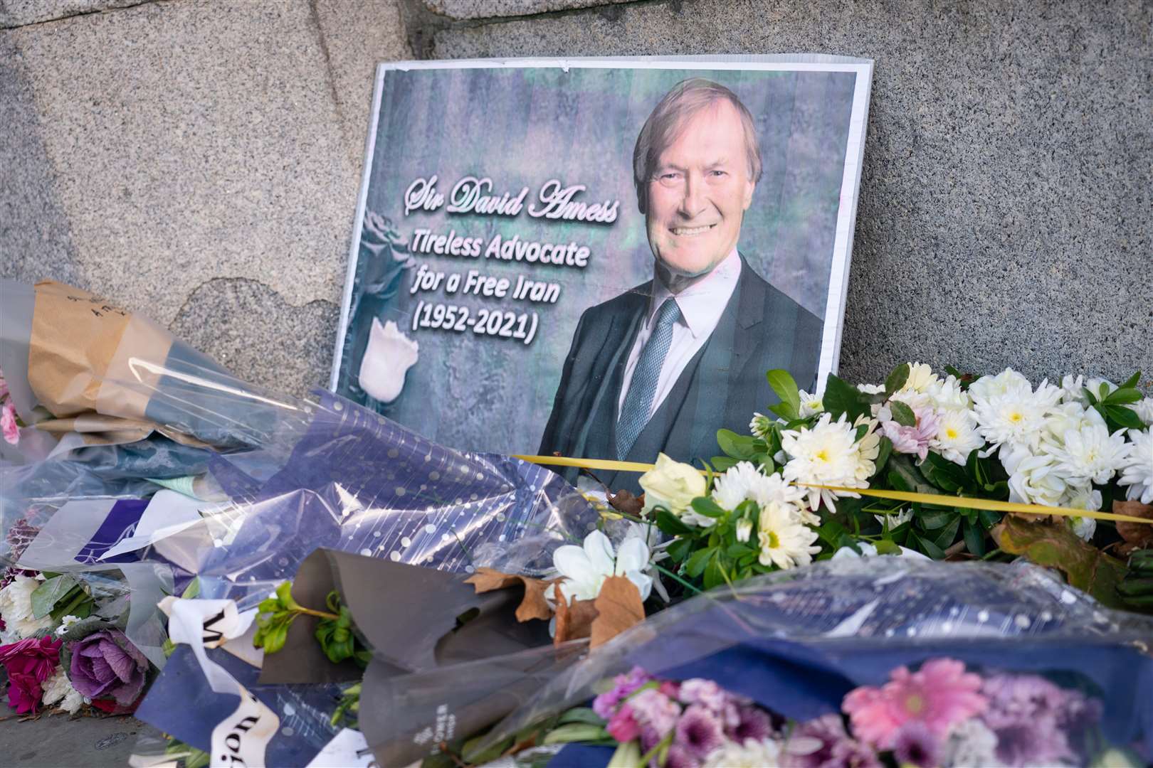 Tributes to Sir David Amess outside the Houses of Parliament (Dominic Lipinski/PA)