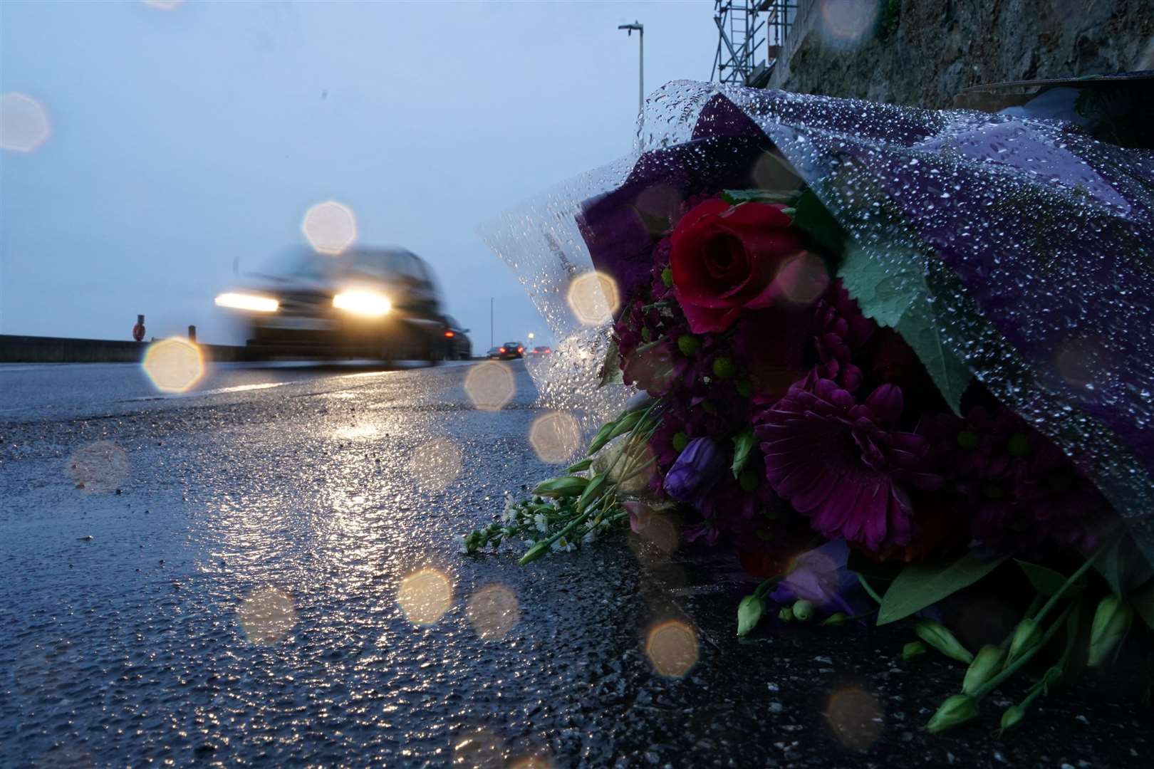 Flowers left at the scene (Gareth Fuller/PA)