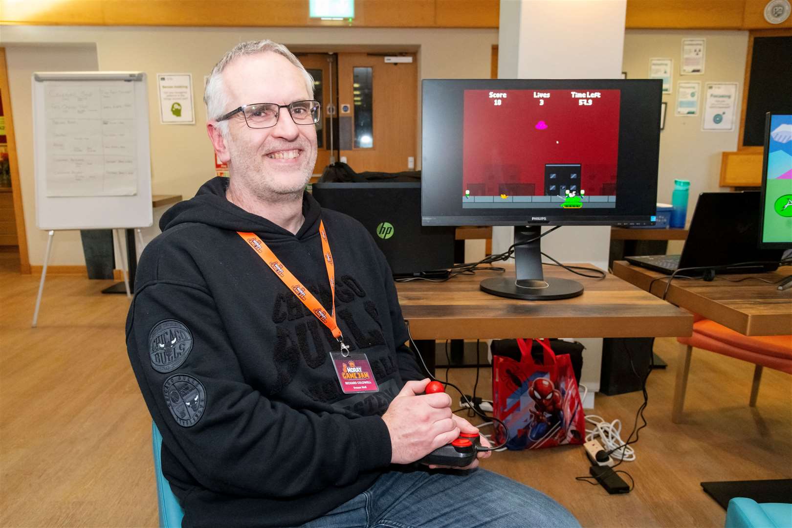 Richard Coldwell with his game Alien Abductor at the Moray Game Jam 2024 with the theme Up Up and Away held at UHI Moray, in the Beechtree Restaurant. Picture: Beth Taylor