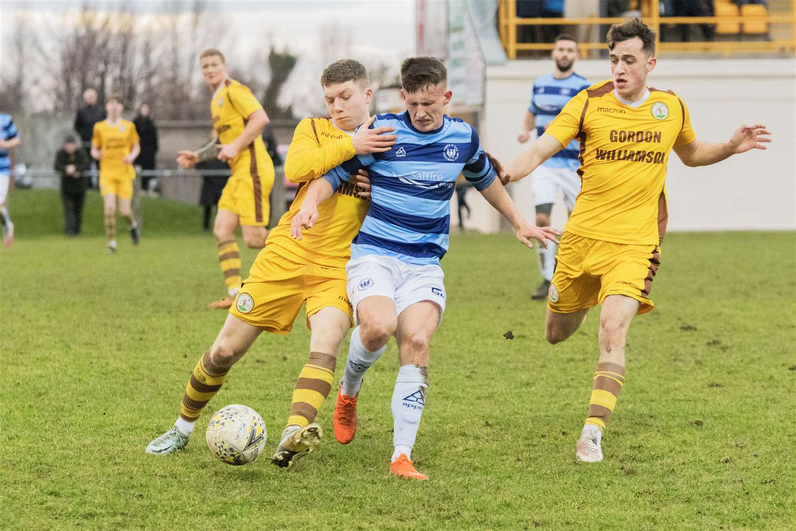 Forres Mechanics' Craig Mackenzie and Banks O' Dee's Lewis Crosbie tussle to win the ball. ..Forres Mechanics F.C v Banks O' Dee F.C at Mosset Park...Picture: Beth Taylor.