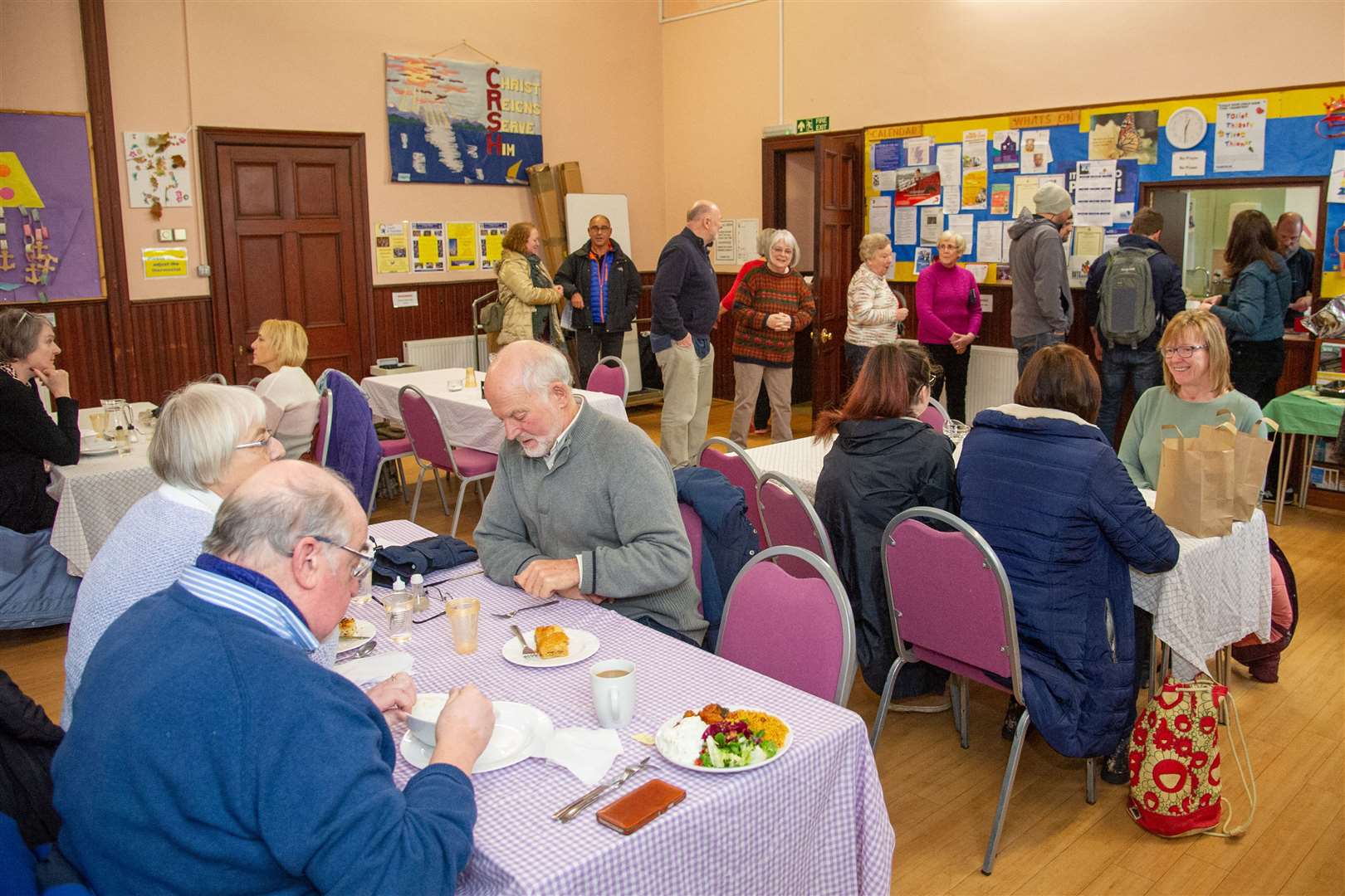 A busy lunchtime at St Leonard's Church Hall.