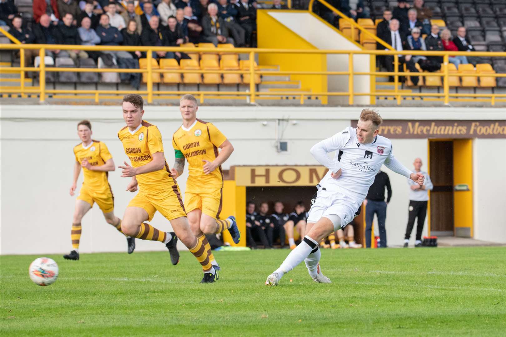 Rothes midfielder Fraser Robertson scores the second goal for the visiting Speysiders. Picture: Daniel Forsyth