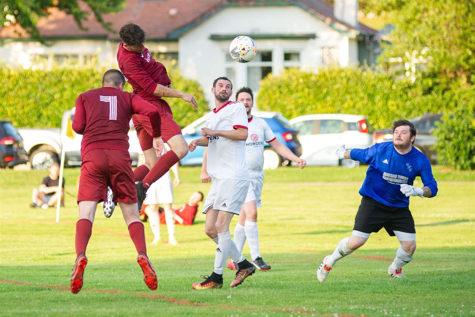 Westerlea's Danny Gresham rises high but can only head this effort wide. ..Carisbrooke FC (1) vs Westerlea FC (0) - Top Car Cup Final - Roysvale, Forres 16/07/2021...Picture: Daniel Forsyth..
