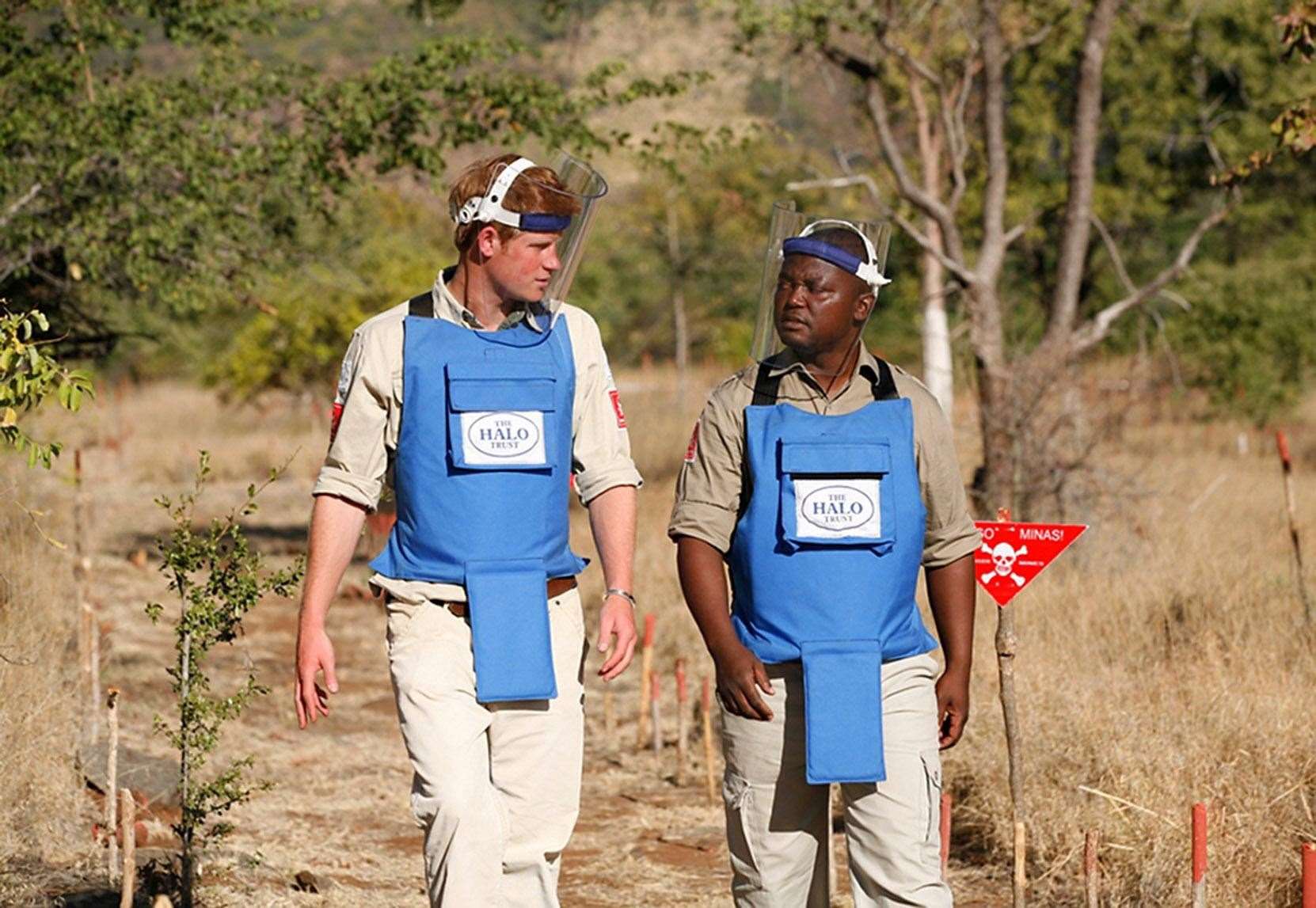 Harry touring a minefield in Tete Province, Mozambique, in 2010 (Fiona Willoughby /Halo Trust/PA)