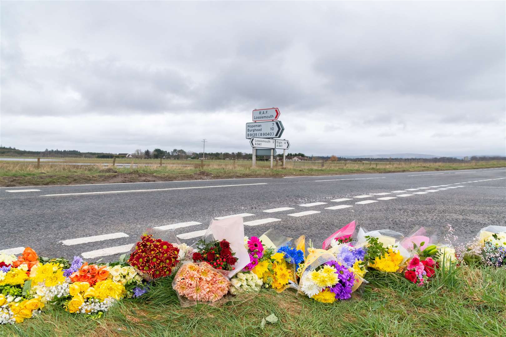 Tributes have been left on the Lossiemouth to Elgin road (A941) after the death of two teenagers on Monday, March 25. Picture: Beth Taylor
