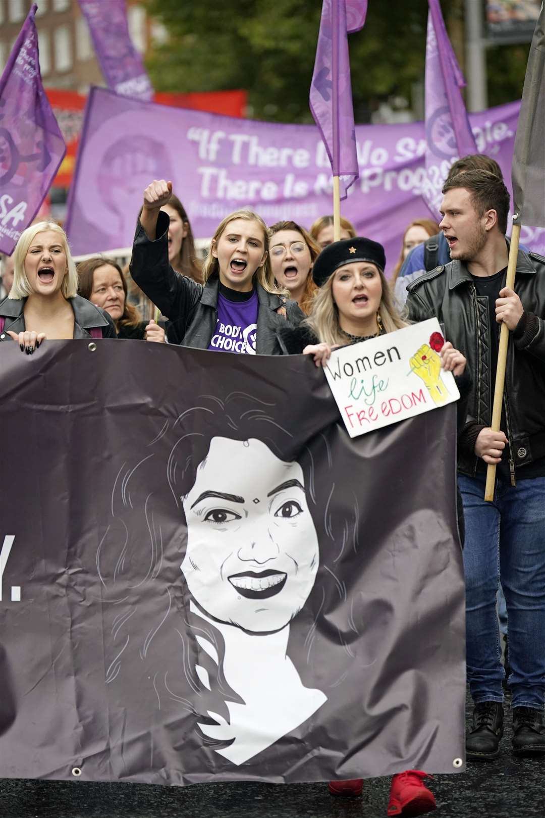 People march on O’Connell Street, Dublin, urging the removal of what they say are barriers that are forcing some pregnant women to travel to access abortion (Niall Carson/PA)