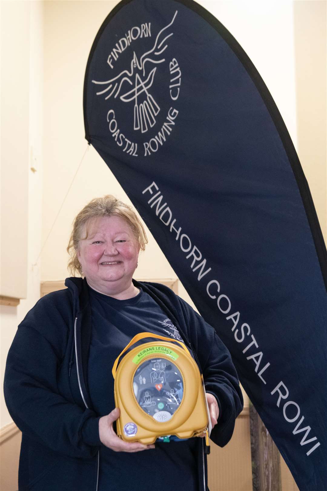 Jenifer O'Hagan of Findhorn and Kinloss Community Council was given a defibrillator to place in the South Side community by Maclean Macleod and Keiran's Legacy. Picture: Beth Taylor