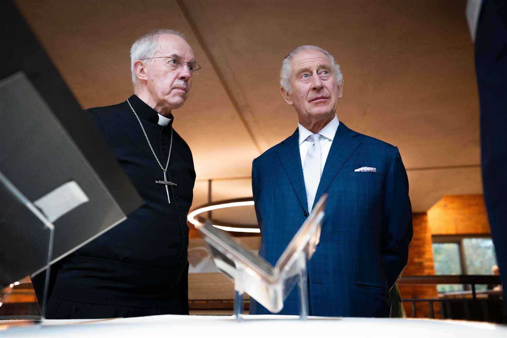 Charles and the Archbishop of Canterbury Justin Welby at the reception of faith leaders in Lambeth Palace Library in London (James Manning/PA)