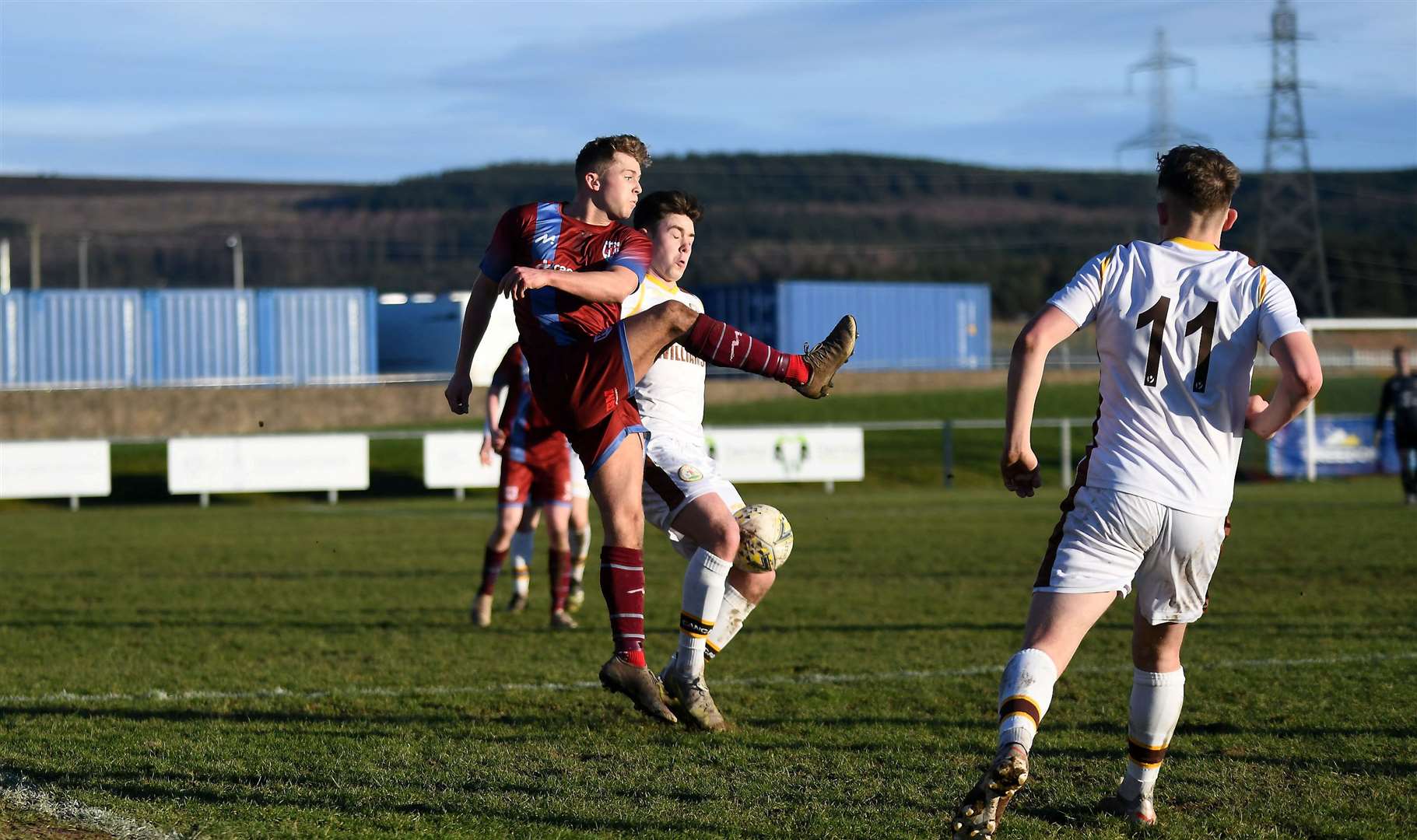 Kieran Mooney under pressure from Forres right-back Thomas Brady. Picture: Becky Saunderson