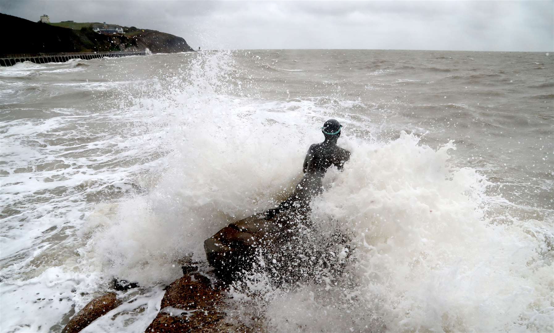 Stormy seas around the Folkestone Mermaid statue in Kent (Gareth Fuller/PA)