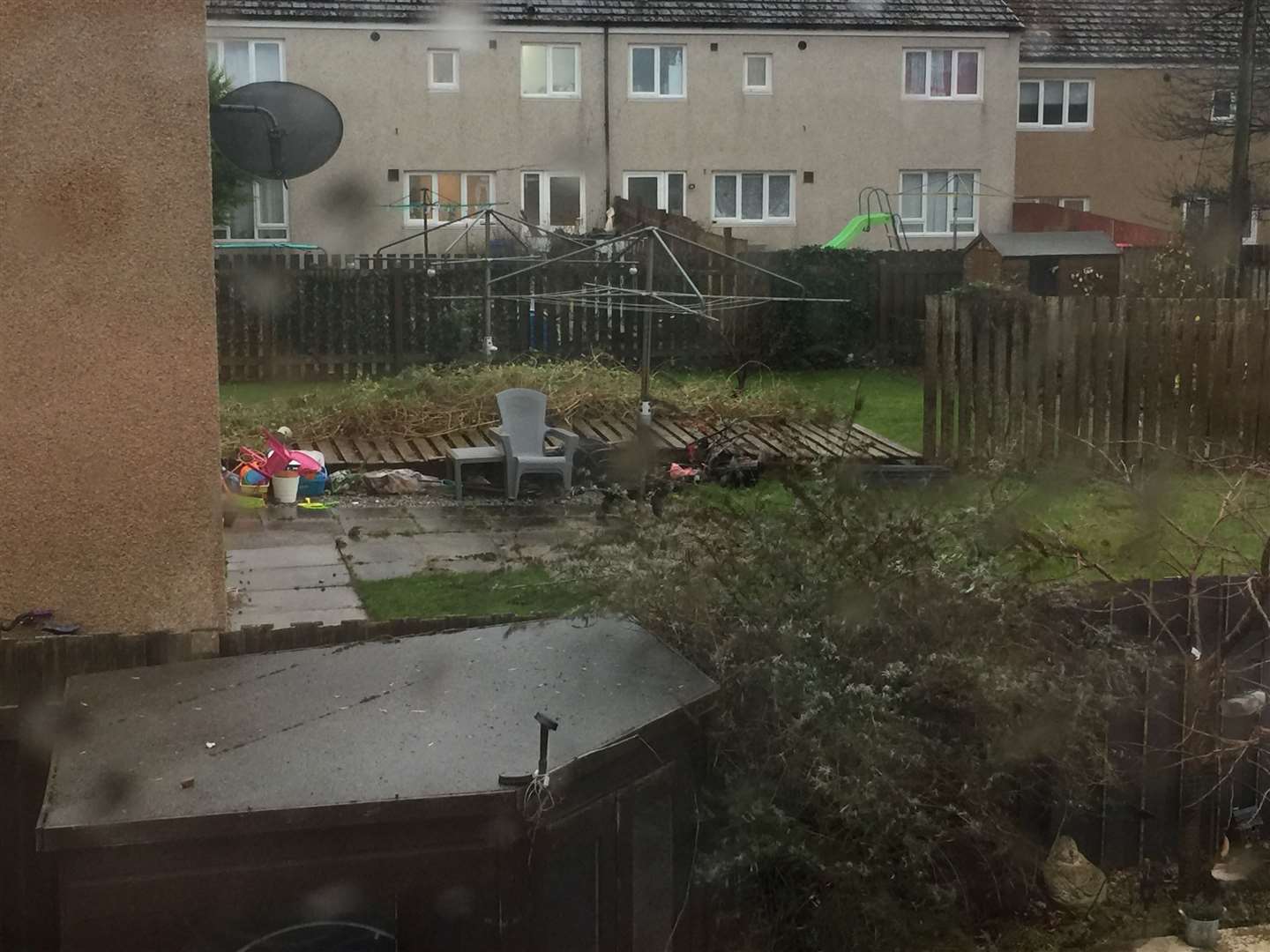 A garden fence blown down in Lossie. Picture: Sara-Jayne Coull