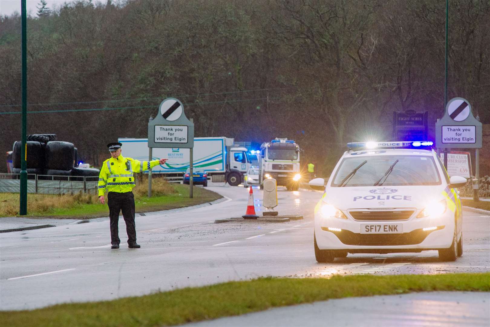 Emergency services at the scene of the accident on the A96.