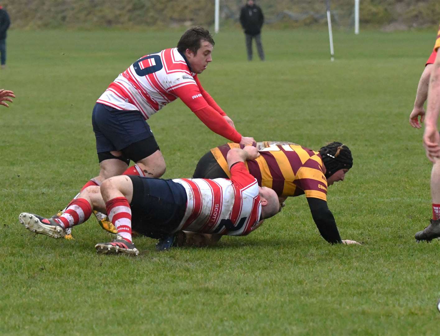 Marc Higgins takes Ellon forward to deck assisted by Cameron Hughes. Picture: James Officer