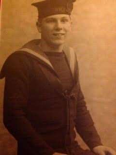 A younger Bert in his navy uniform.