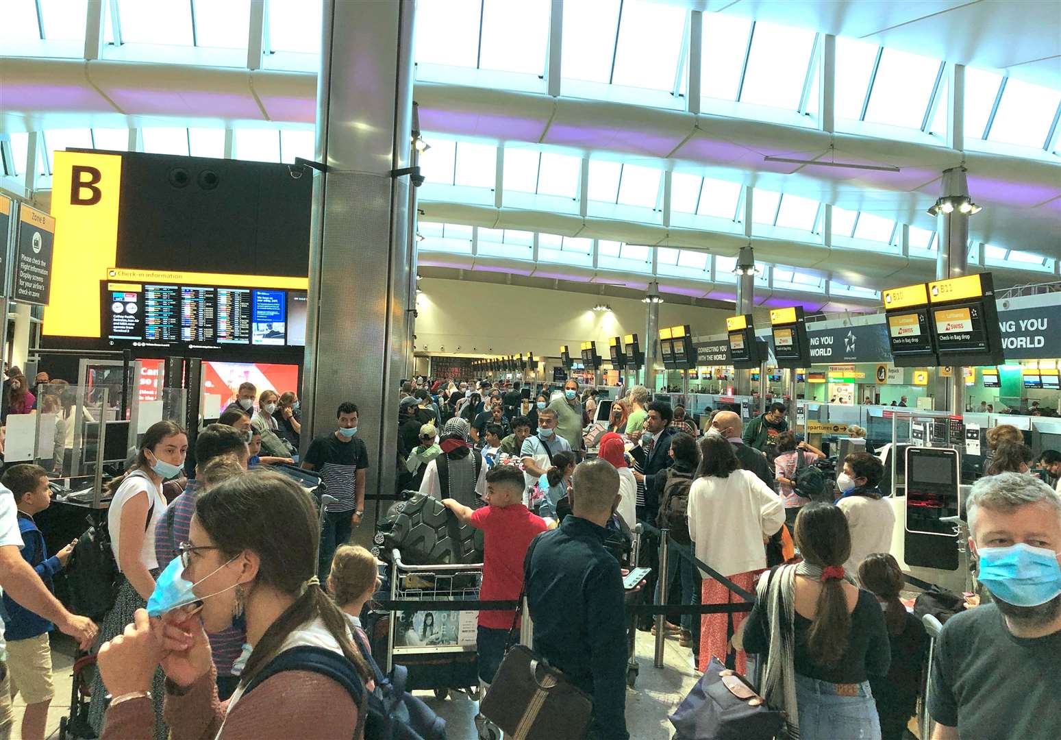 Travellers faced long queues at Heathrow Airport on Saturday (Fiona Brett/PA)