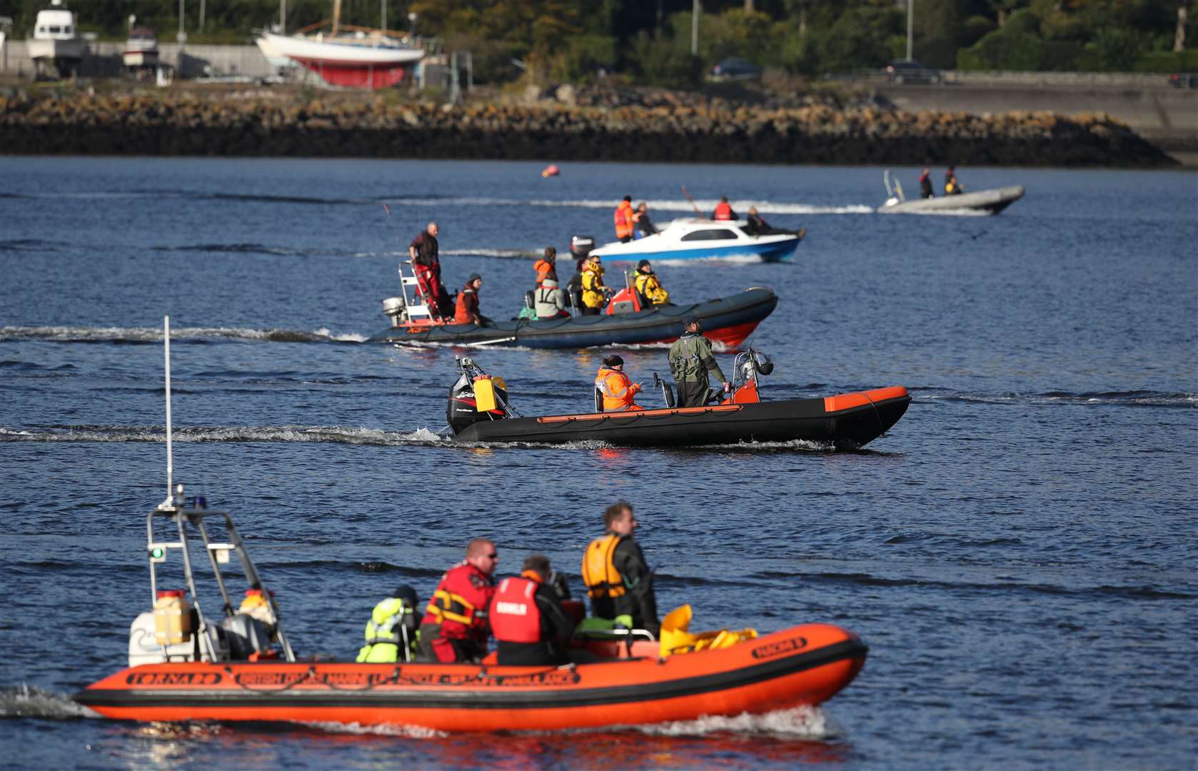 Several boats were involved in the operation on Thursday (Andrew Milligan/PA)