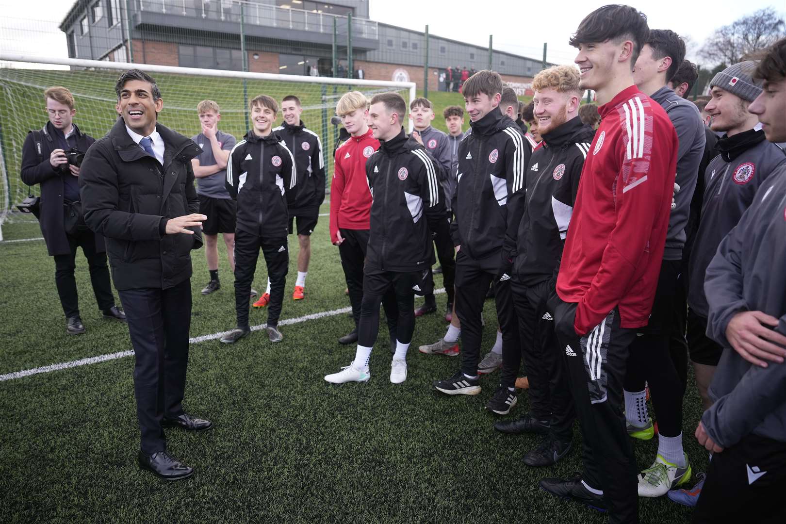 Prime Minister Rishi Sunak speaks to young football players during a visit to Accrington Stanley Community Trust in Lancashire (Christopher Furlong/PA)