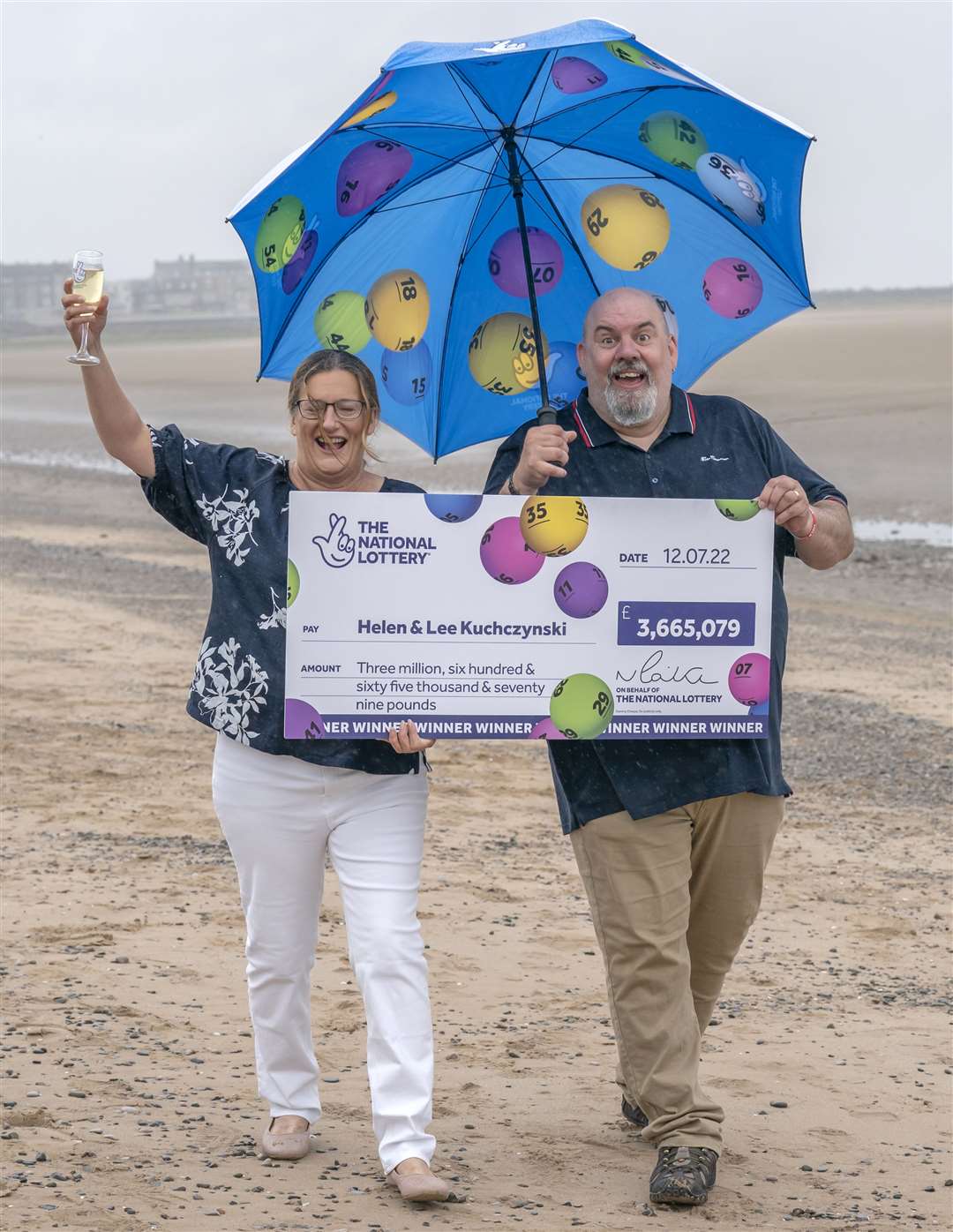 Helen and Lee Kuchczynski, from Cumbria, celebrate their £3.6 million EuroMillions win (Danny Lawson/PA)