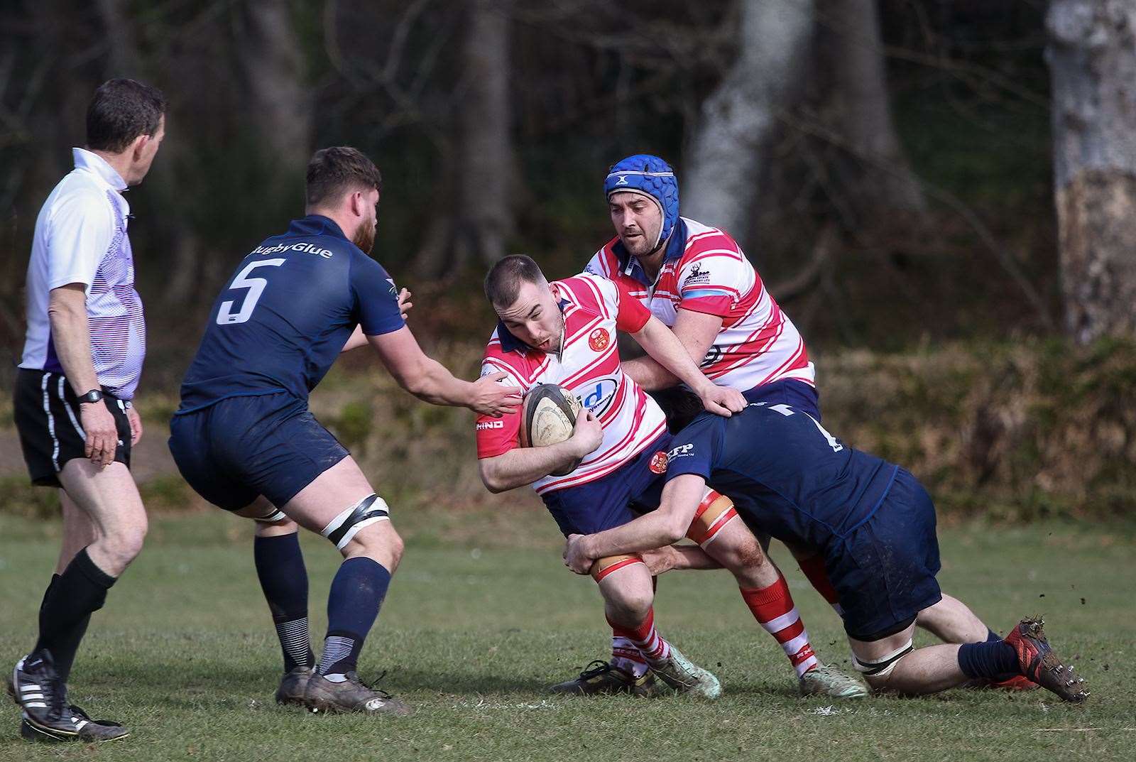 Lewis Small tackled, David Clarke in support. Picture: John MacGregor