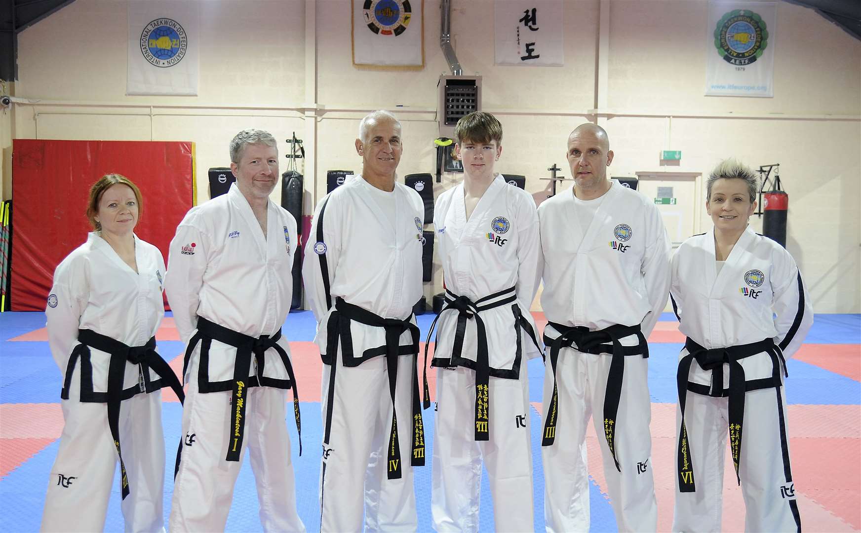 Black belt members Donna McLean 2nd degree, Gary Mackintosh 1st degree, Alan Thomson 4th degree, Lennon Porter 1st degree, Barry Scrimgeour 3rd degree and Maree McDonough 4th Degree.