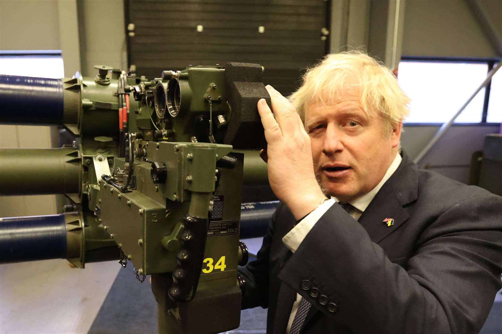 Boris Johnson with a Mark 3 shoulder launch LML missile system at Thales in Belfast (Liam McBurney/PA)