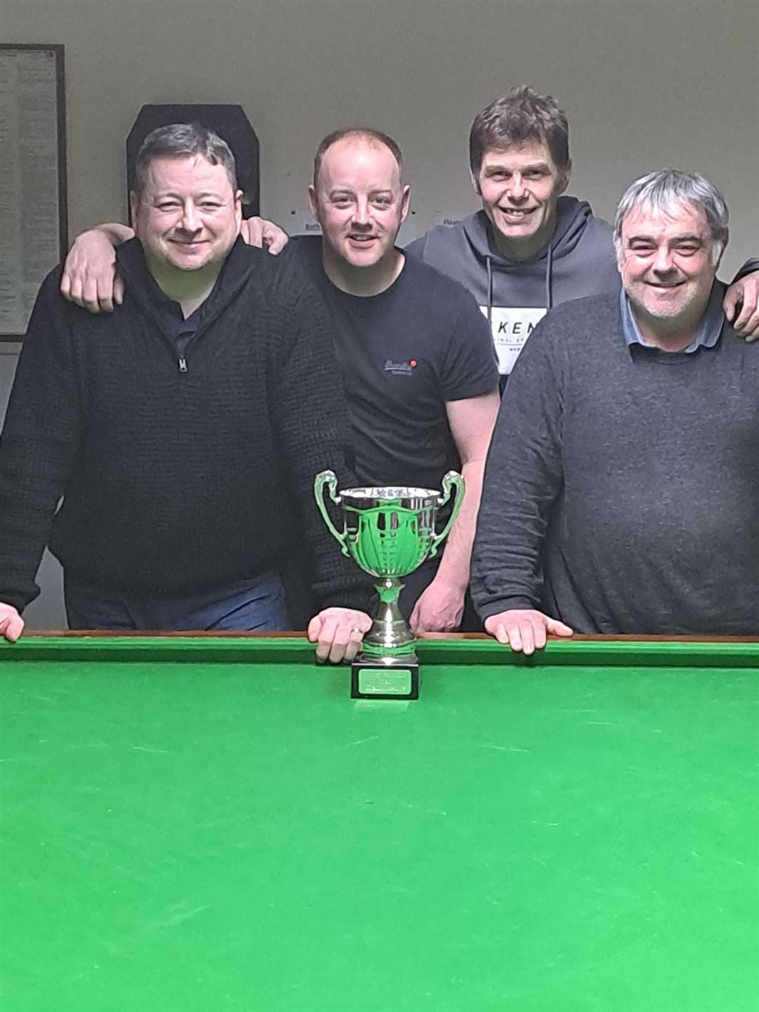 The title-winning Forres Legion 2 team of Stephen Hepburn, Simon Bremner, James McKenzie and Sean Hepburn with their silverware.