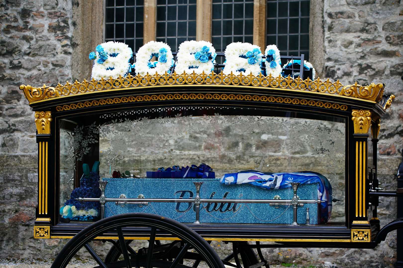 Bobbi-Anne McLeod’s coffin was taken to the church in a horse-drawn carriage (Ben Birchall/PA)