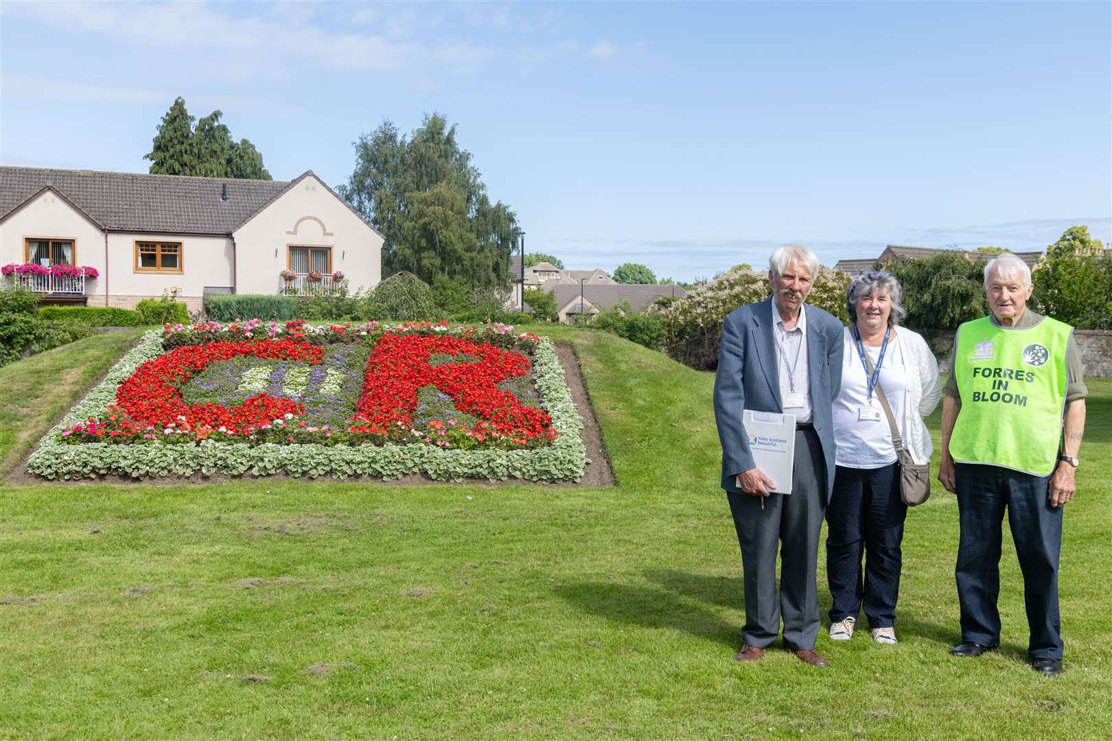 Bob Davidson of Forres In Bloom (right) with the Keep Scotland Beautiful judges Terry Stott and Penny Wright.