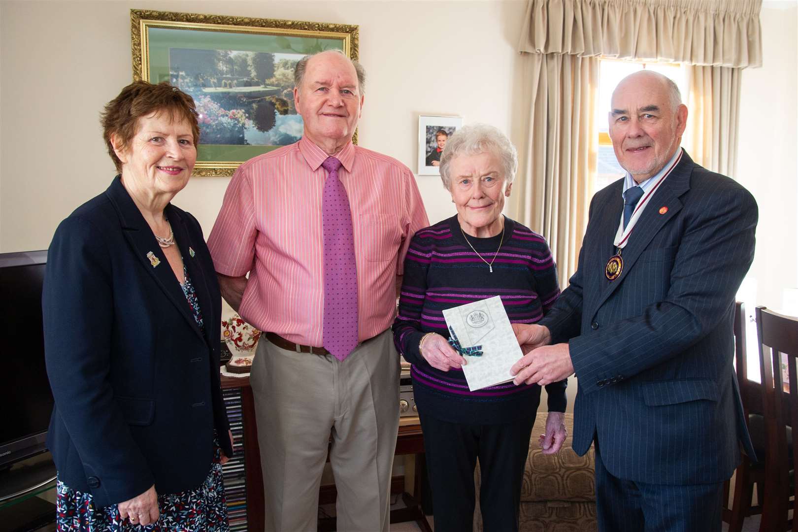Ian and Isobel are joined by George Macintyre, Depute Lord Lieutenant and Lorna Creswell, local Forres Councillor...Ian and Isobel Christie, orginally from Brora, celebrate 60 years of married life at the house in Forres. ..Picture: Daniel Forsyth..