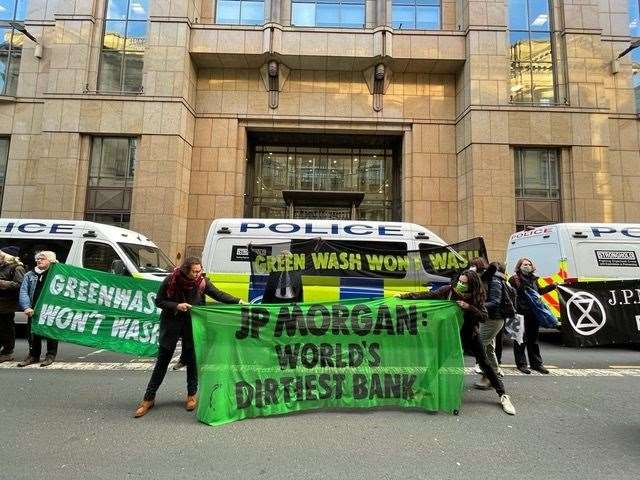 Extinction Rebellion making their point outside JP Morgan in Glasgow. Picture by Mark Richards @AuroraFindhorn