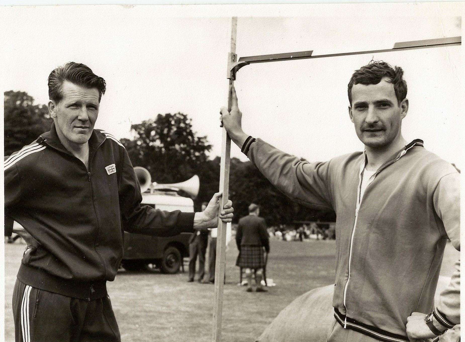 John (right) competed for several years in the high jump at Forres Highland Games. He is pictured with champion Crawford Fairbrother in 1972.