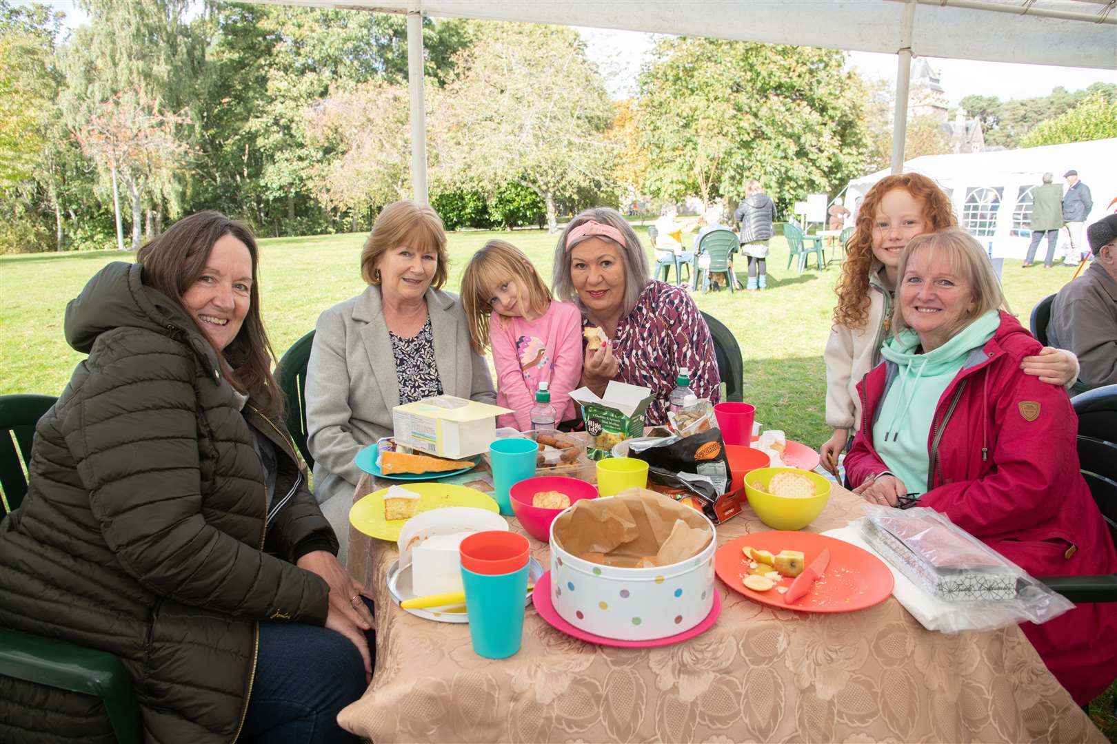 Family and friends enjoying a picnic in the hospital grounds. Picture: Daniel Forsyth..