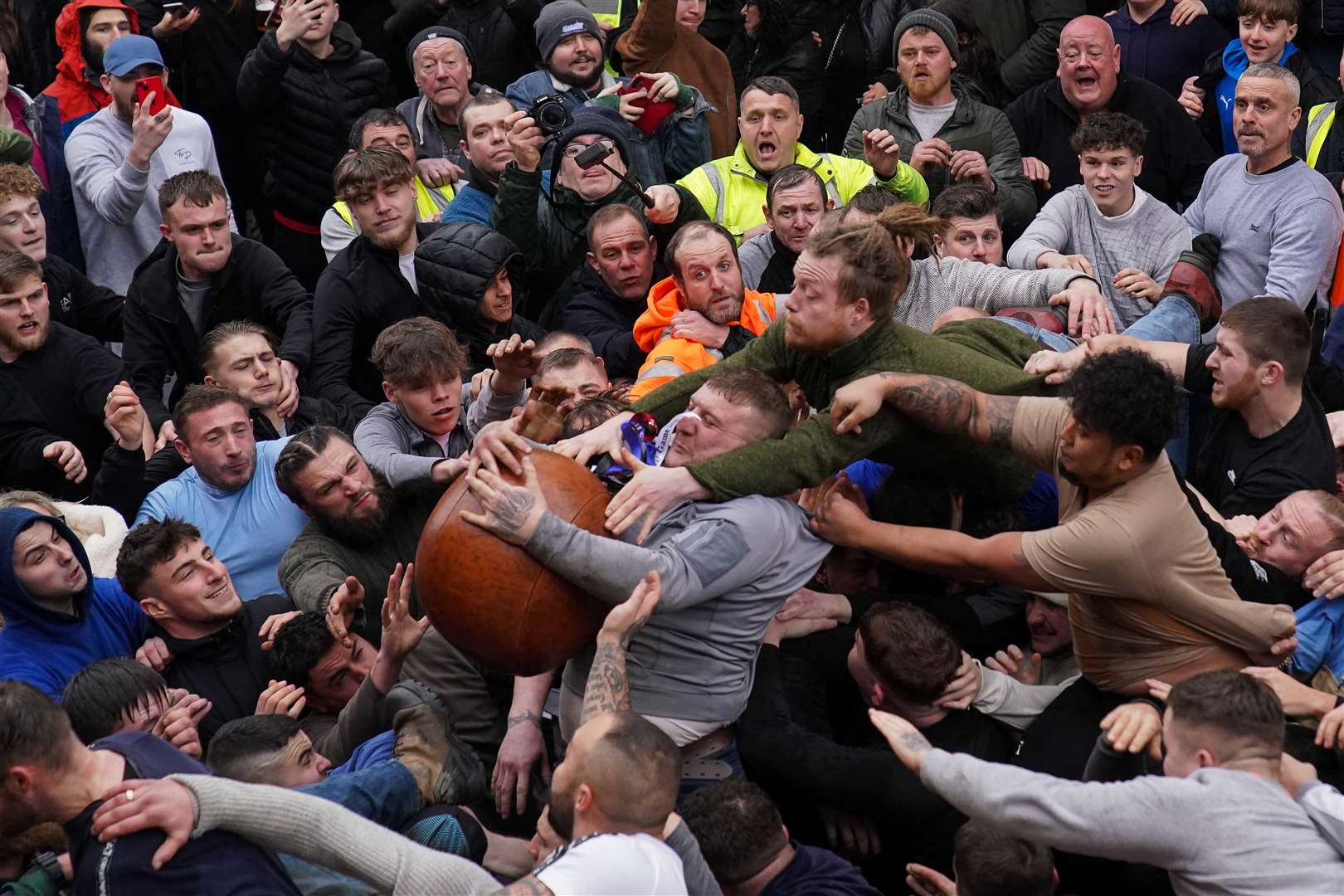 Players take part in the 824th Atherstone Ball Game (Jacob King/PA)