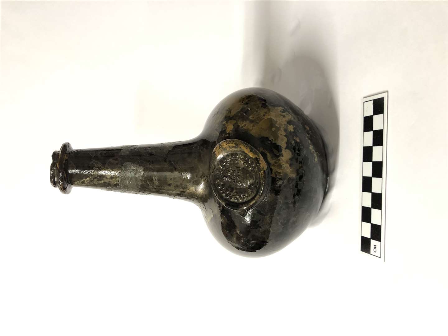 One of the bottles found with the wreck bears a glass seal with the crest of the Legge family – ancestors of George Washington, the first US President (Norfolk Historic Shipwrecks/PA)