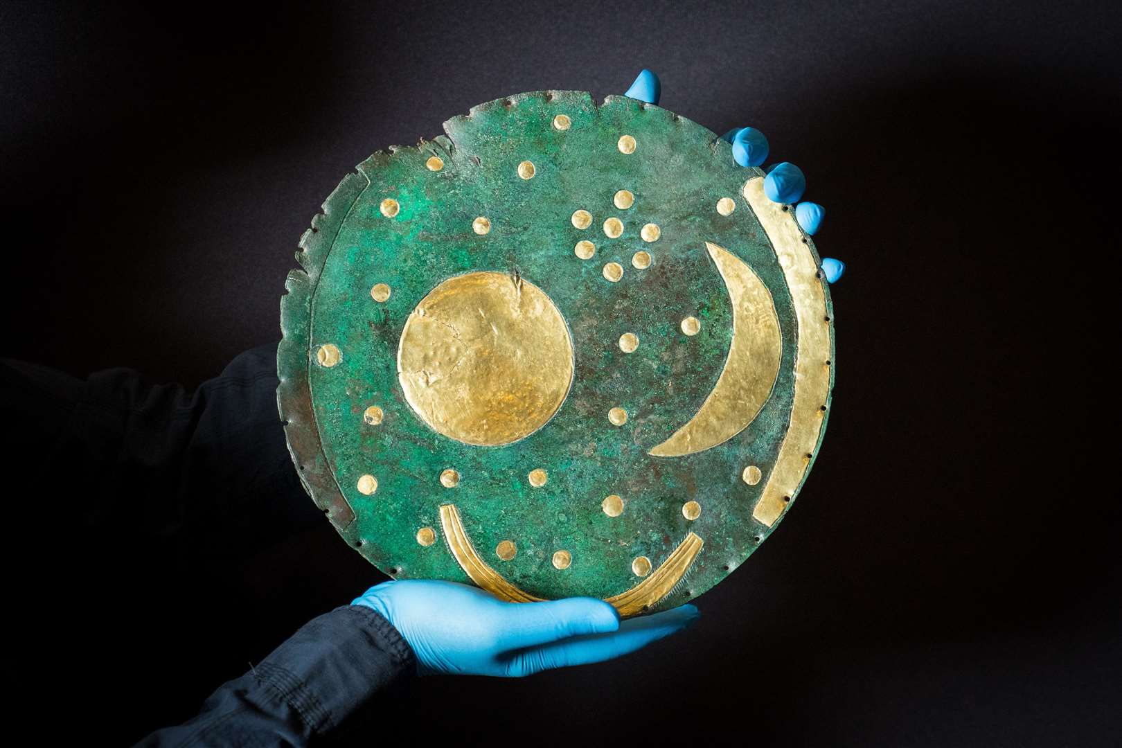 The Nebra Sky Disc will feature in the British Museum’s Stonehenge exhibition (Dominic Lipinski/PA)