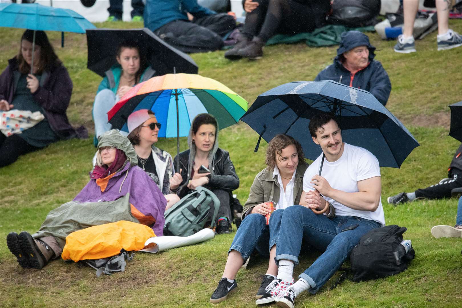 Umbrellas were vital accessory for the day which suffered from heavy rain showers throughout. ..Forres Highland Games 2022...Picture: Daniel Forsyth..