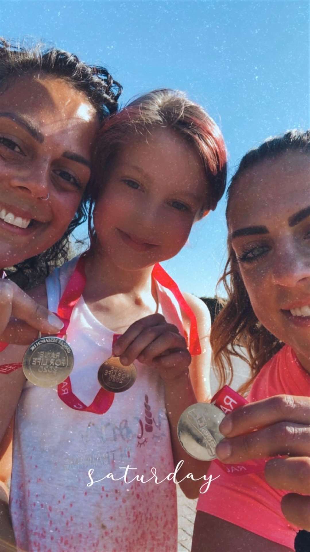 Daniella, Georgie and Jordanna with their medals.
